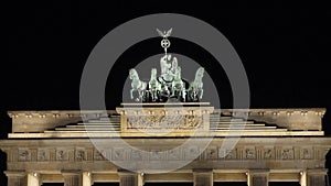 Night view of the Brandenburg Gate in Berlin, people are walking in the square, Germany at night, Berlin