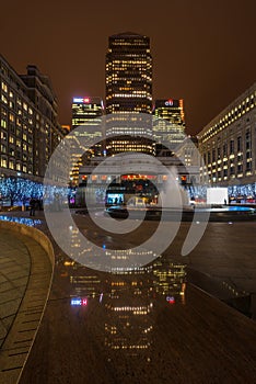 Night view of Cabot Square in Docklands, London, UK