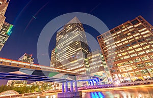 Night view of Canary Wharf skyscrapers, London - UK