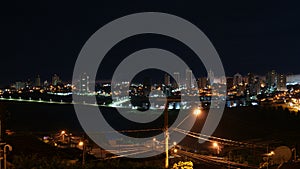 Night view of a city in the interior of Brazil, with buildings, houses, lighting and streets