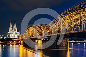 Night View Of Cologne Cathedral And Hohenzollern Bridge, Germany