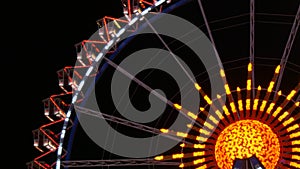 Night view of colorful glowing ferris wheel at world-famous beer festival Oktoberfest