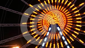 Night view of colorful glowing ferris wheel at world-famous beer festival Oktoberfest