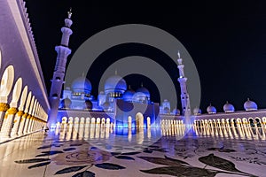 Night view of the courtyard of Sheikh Zayed Grand Mosque in Abu Dhabi, United Arab Emirate