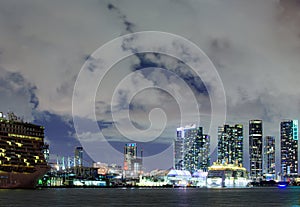 Night view of cruise liners near Miami Port. Miami downtown. Cruise ship in the Port of Miami at sunset with multiple