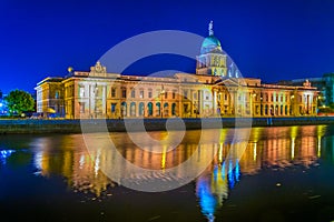 Night view of the Custom house situated next to the river lIffey in Dublin, Ireland