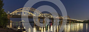 Night view of the Darnitsky Railway Bridge.