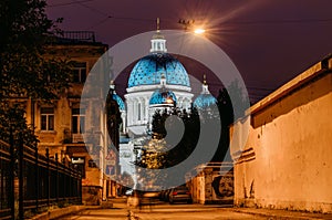 Night view domes with stars of the Troitsky Cathedral in Saint-Petersburg