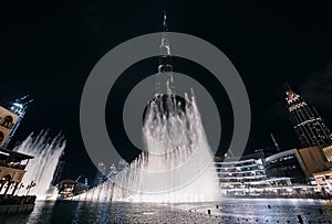 Night view of the Dubai Fountain and Burj Khalifa, the tallest building in the world.