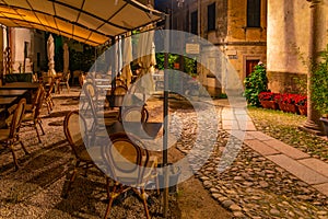 Night view of empty streets of Isola Superiore dei pescatori at Lago Maggiore, Italy