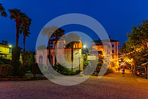 Night view of empty streets of Isola Superiore dei pescatori at Lago Maggiore, Italy