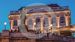 Night view of equestrian statue of Archduke Albert in front of the Albertina Museum day to night timelapse in Vienna photo