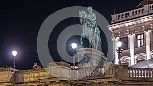 Night view of equestrian statue of Archduke Albert in front of the Albertina Museum timelapse in Vienna, Austria