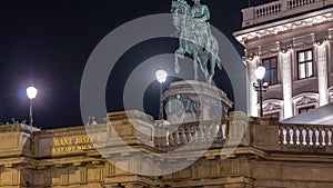 Night view of equestrian statue of Archduke Albert in front of the Albertina Museum timelapse in Vienna, Austria