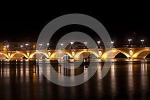 Night view of the famous bridge of Bordeaux called Le Pont de Pierre