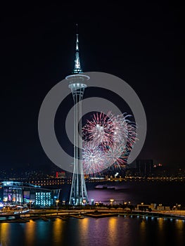 Night view of the fireworks over Macau Tower Convention and Entertainment Center