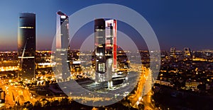 Night view of the four towers of the business district in Madrid. Spain photo