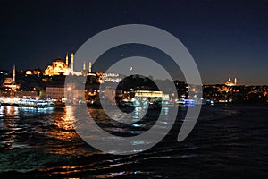 Night view from the Galata Bridge, in Istanbul (Turkey). Golden horn photo