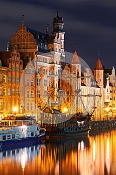 Night view of Gdansk harbor and Motlawa river, located in the Old Town of Gdansk city, Poland