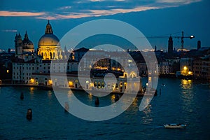 Night view of Grand Canal and basilica di santa maria della salute in Venice, Italy