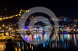 Night view of harbour, fortress and night lights in Alanya, Turkey.