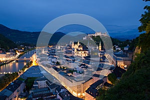 Night view on the historical centre of Salzburg city and Hohensalzburg fortress and Salzach river