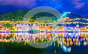 Night view of a historical wooden district Bryggen in the norwegian city Bergen....IMAGE