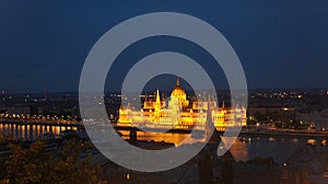 Night view of the Hungarian Parliament building on the bank of the Danube in Budapest, Hungary