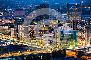 Night view of illuminated street in the Oslo business center. Modern architecture. Norway