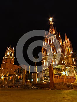 Night view of La Parroquia de San Miguel Arcangel and clock tower in San Miguel de Allende photo