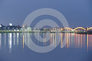 Night view of the lake and the bridge across the river