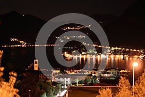 Night view of lake Iseo, Lombardy, Italy photo