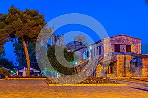 Night view of Lala Mustafa Pasa Mosque behind Namik Kemal prison in Famagusta, Cyprus