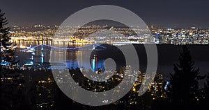 Night view of Lions Gate Bridge, Vancouver downtown, and Lower M