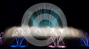 Night view of Magic Fountain light show in Barcelona, Spain.