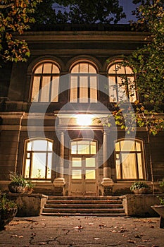 Night view of the main entrance to the old house