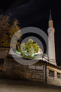 Night view of the minaret of  Gazi Husrev-beg Mosque in Sarajevo. Bosnia and Herzegovina