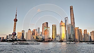 Night view of the modern Pudong skyline across the Bund in Shanghai, China. Shanghai is the largest Chinese city