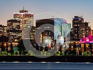 Night view of the Montreal city skyline, city hall with St Lawrence river