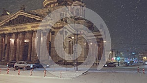 Night view of the monument St. Isaac's Cathedral in snowfall, Saint-Petersburg, Russia