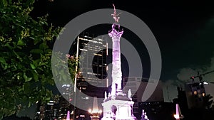 night view of monument to independence on paseo de la reforma avenue in mexico city