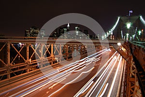 Night view of the most emblematic buildings and skyscrapers of Manhattan (New York). Brooklyn bridge. River Hudson. photo