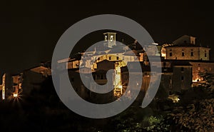 Night view of a mountain-side Tuscany village