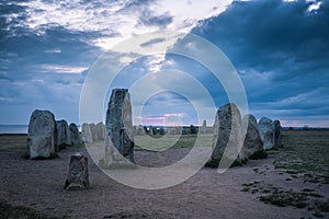 Night view of the mysterious Ales stones on the south east coast of Sweden photo