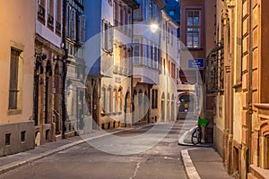 Night view of a narrow street in the old town of Strasbourg, France