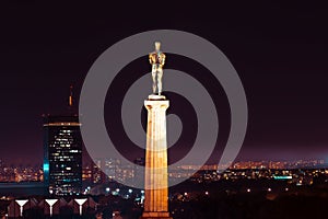 Night view of New Belgrade and Pobednik The Victor monument from Belgrade fortress. Belgrade, Serbia