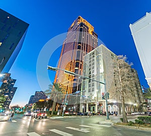 Night view of New Orleans buildings from street level