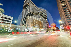 Night view of New Orleans buildings from street level