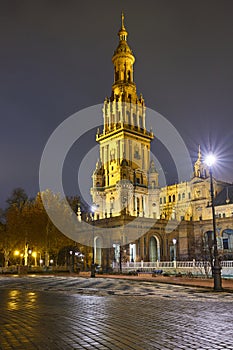 Night view of Nord Tower on Plaza de Espana after rain