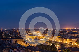 Night view of the old city in Florence over the Ponte Vecchio, Florence, Italy